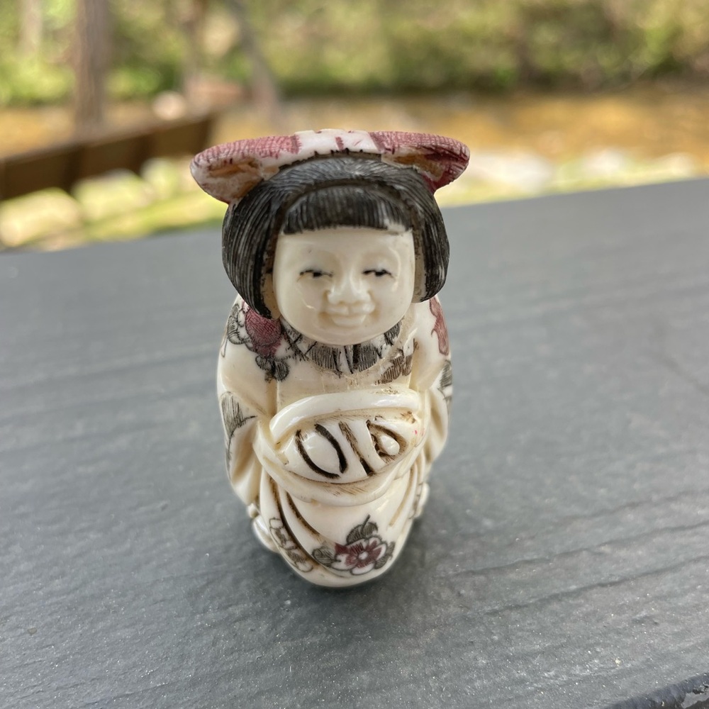 One finely carved Chinese bone netsuke ladies. Signed on the bottom 1”